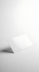 Minimalist Blank White Rectangular Card Mockup Leaning on a Clean Background
