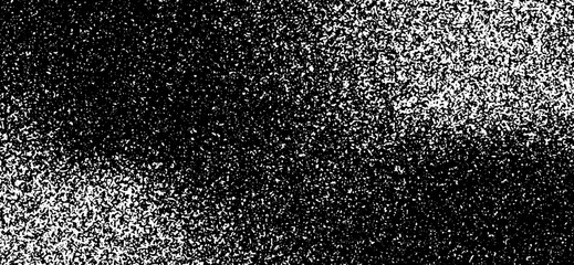 Abstract black and white grunge background showcases a heavily contrasted texture with scattered white spots and particles against a dark, grainy backdrop that creates depth and visual interest