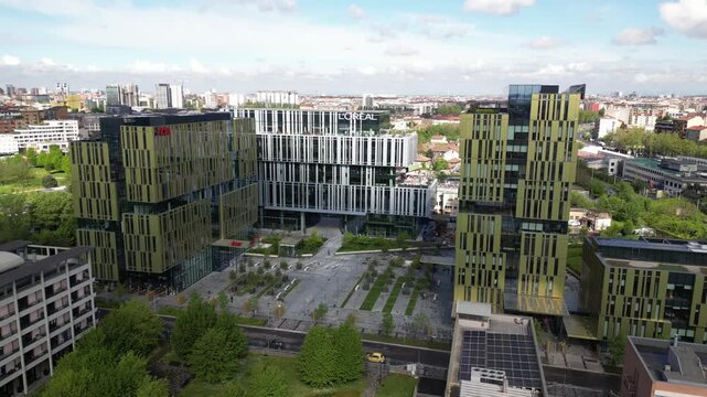 EUROPE, ITALY, MILAN 09,23,2025  NTT DATA and Loreal new building headquarter skyscrapers in downtown of Milan - Drone aerial view of skyline with new modern area and new companies in  Romolo district