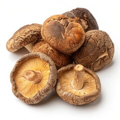 Pile of dried shiitake mushrooms isolated on white background