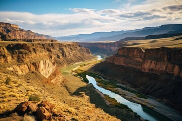 Vast canyon landscape with winding river and dramatic cliffs rock