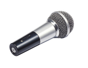 A silver and black microphone is angled against a black background.