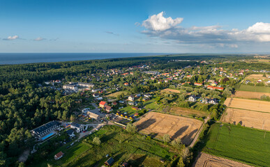 The village of Jantar illuminated by the setting summer sun, Baltic Sea coast, northern Poland