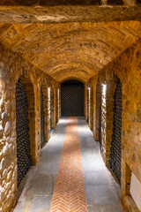 Stored wine bottles, wine cella, Canale, Piedmont, Italy