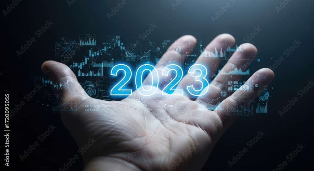 Poster forecasting business growth and innovation in 2023 with a hand presenting the year amidst data visua