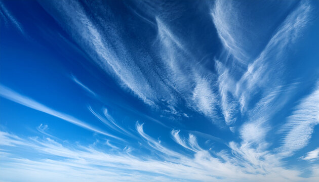 Wispy Cirrus Clouds Streaking Across A Vibrant Blue Sky White - Powered by Adobe