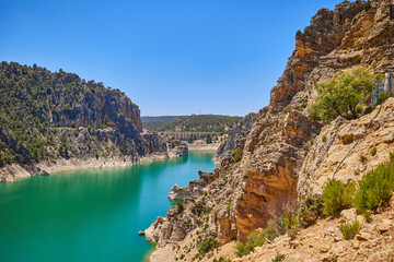 View from above of a reservoir with turquoise water