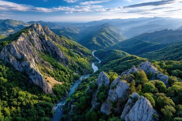 Aerial view of river canyon and mountains at sunset