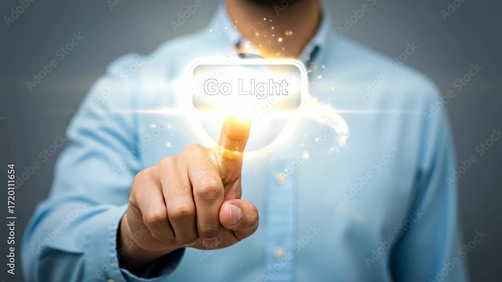 Poster hand pressing glowing go light button - a close-up shot of a hand pressing a glowing button that say