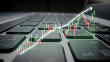 This image illustrates the intersection of finance and technology, showcasing a stock market trend with candlestick charts on a laptop keyboard, symbolizing growth and analysis. Copula