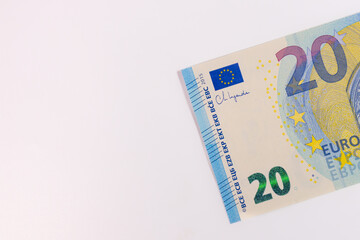 Close-up of a 20 euro banknote on a white background, representing money, finance, savings, currency, or economic value.