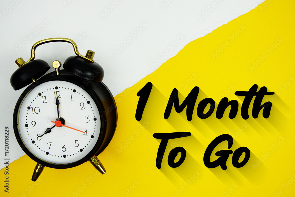Poster 1 month to go text and alarm clock on yellow background