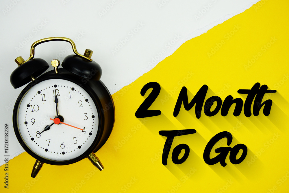 Poster 2 month to go text and alarm clock on yellow background