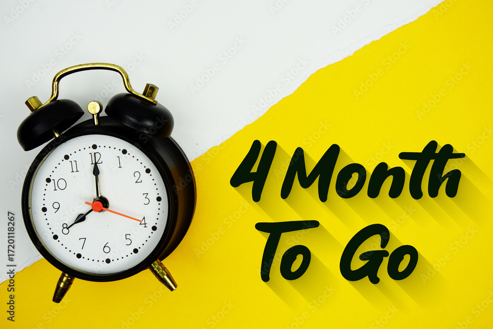 Poster 4 month to go text and alarm clock on yellow background