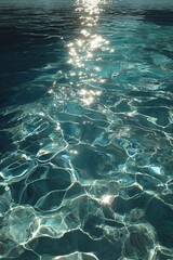 Glistening water surface reflecting sunlight with beautiful ripples and tranquility.