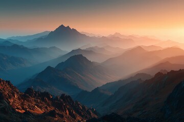 Stunning mountain range at sunset with serene layers and calming hues of nature.