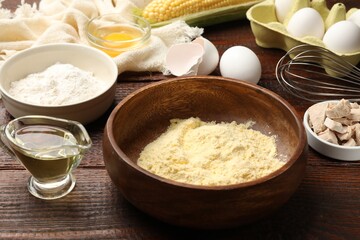 Making cornbread. Different ingredients on wooden table, closeup