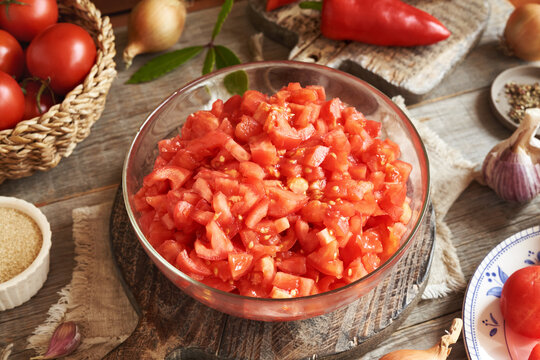 Peeled and chopped tomatoes - preparation of homemade tomato relish (ajvar-style vegetable spread, chutney or bruschetta topping)
