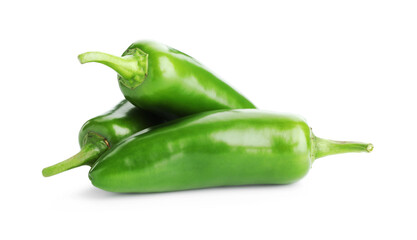 Many green jalapeno peppers isolated on white