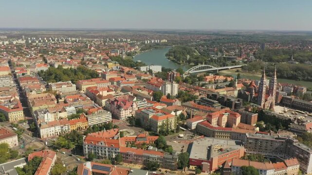 Aerial view of szeged cityscape with red rooftops and river tisza