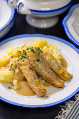 rabbit with cream sauce and mashed potatoes