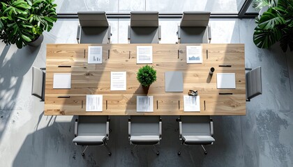 Modern conference room with wooden table, chairs, and documents, viewed from above, creating professional atmosphere