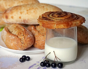 A Still Life of a Rustic Morning Meal with Freshly Baked Bread - Fresh bread and a glass of milk