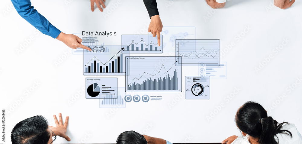 Aufkleber a diverse team engages in a collaborative meeting focused on data analysis, exploring charts and gra