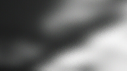 Abstract textured background with a gradient of dark gray to bright white suggesting light and shadow play