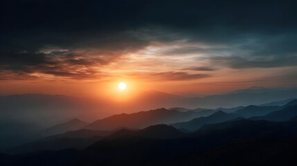 A vibrant golden sun ascends over a majestic layered mountain range illuminating the hazy atmosphere at dawn with warm dramatic light