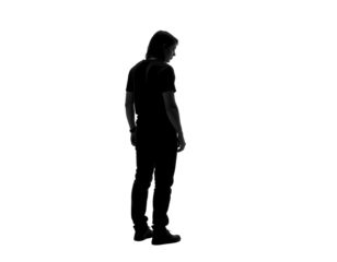 Silhouette of a Person Standing Alone Against a Transparent background