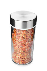 Dried carrot flakes in spice jar isolated on white
