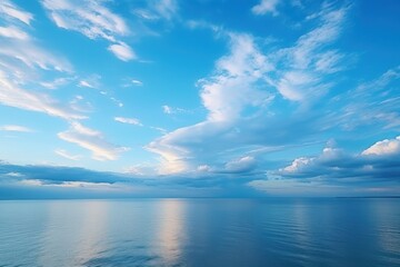 Vast blue ocean meeting dramatic sky clouds water