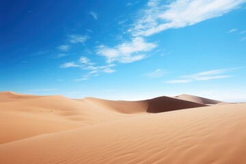Endless golden sand dunes under vast azure sky desert landscape