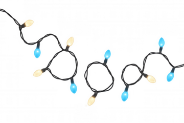 Glowing christmas string lights garland creating festive decorations with blue and warm white bulbs on transparent background