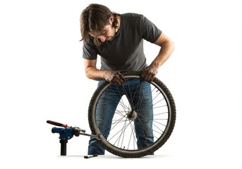 Focused repairman addressing bicycle tire issues with specialized repair tools
