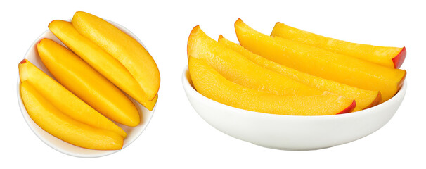 mango slices in ceramic bowl isolated on white background. Top view. Flat lay