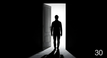 Man Silhouetted In A Brightly Lit Doorway