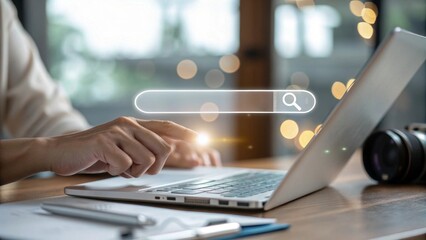 Obraz premium Hand interacting with glowing holographic search bar above modern desk digital interface office environment close-up view technology concept
