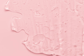 Liquid pink gel texture, clear beauty serum background