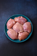 Raw chicken thigh fillet, poultry meat as a source of protein. Chicken thigh fillet
