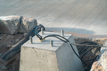 Concrete Base with Electrical Cables Visible