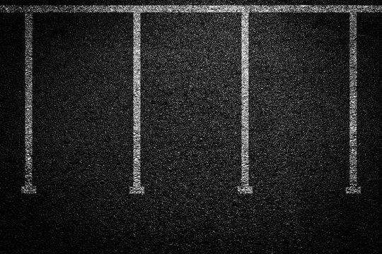 Top view of car park lots on city street or underground garage. Vector background of empty parking with white and yellow lines road marking on black asphalt surface
