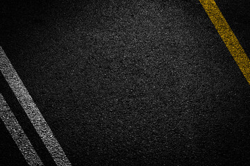 White And Yellow Stripes On Asphalt Road Texture.