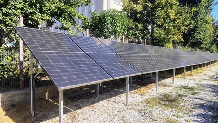 Solar panels installed outdoors on a sunny day, generating renewable energy through sunlight for sustainable electricity production