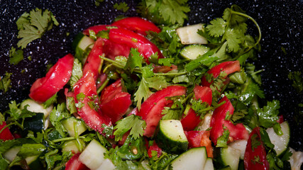 Cucumber tomato salad in the pot