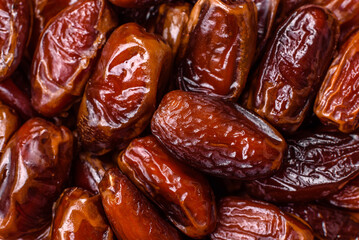 Dried dates in a ceramic plate, arabic food for the ramadan table. Dried dates as a food backgrounds