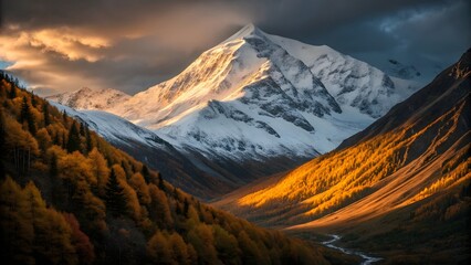 Golden Light on Snow-Capped Mountain Peak with Autumn Forest in Sunset