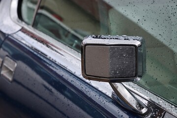 Oldtimer car detail with rain drops