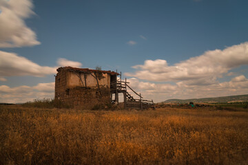 Fototapeta premium Log exposure view of an abandoned farm house in Eskisehir rural Turkey